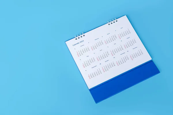 White Desk Calendar Blue Background — ストック写真
