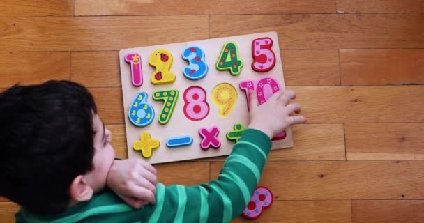 Top View Kid Playing Numeric Board Floor — Vídeo de Stock