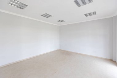 Unfinished building interior, white room.Repairs in the apartment. Preparing in the room.