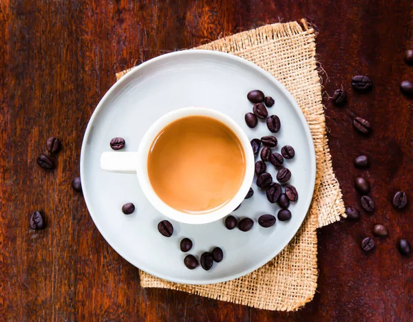 Top View White Coffee Cup Coffee Beans Wood Table Background — Stock Photo, Image