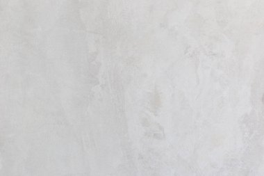 Beton duvara pankart yerleştirmek için kullanılan eski bir duvar gibi doğal çimento veya taş dokunun beyaz beton dokusu..