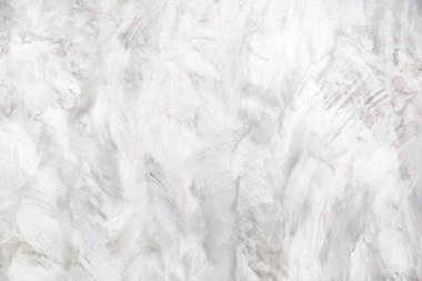 Beton duvara pankart yerleştirmek için kullanılan eski bir duvar gibi doğal çimento veya taş dokunun beyaz beton dokusu..