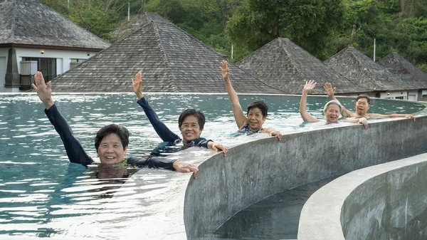 Healthy Asian Elderly Aging Senior Old Friends Exercising Swimming Pool Stockbild