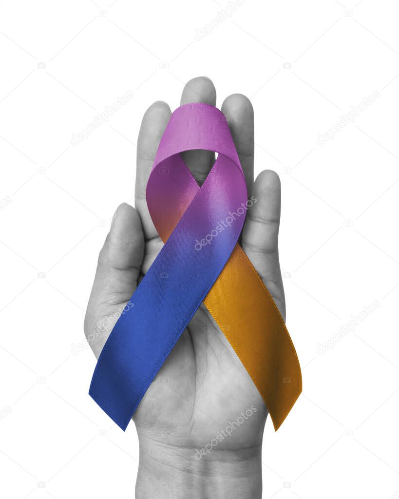 Bladder cancer awareness ribbon with marigold purple blue bow on hand isolated on white background with clipping path
