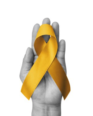 Childhood cancer awareness with gold ribbon isolated on white background with clipping path. Golden bow color for Embryonal Rhabdomyosarcoma, Neuroblastoma and Osteosarcoma awareness