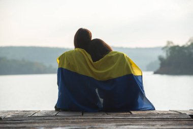 Rusya ve Ukrayna 'ya karşı olan savaşı sona erdirme umuduyla Ukrayna Bayrağı kavramını destekliyoruz..