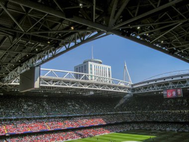 The Millenium Stadium with it's roof open in Cardiff, Wales clipart