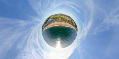 A tiny planet aerial view of the magnificent beach at Slapton Sands in Devon, UK clipart
