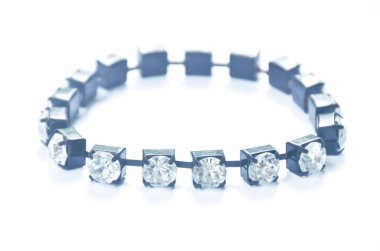  fake diamond bracelet with black rope arranging on white background