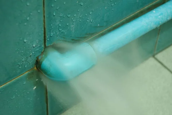 Water Splashing Broken Plumbing Blue Polythene Pipe Line Bathroom — 스톡 사진