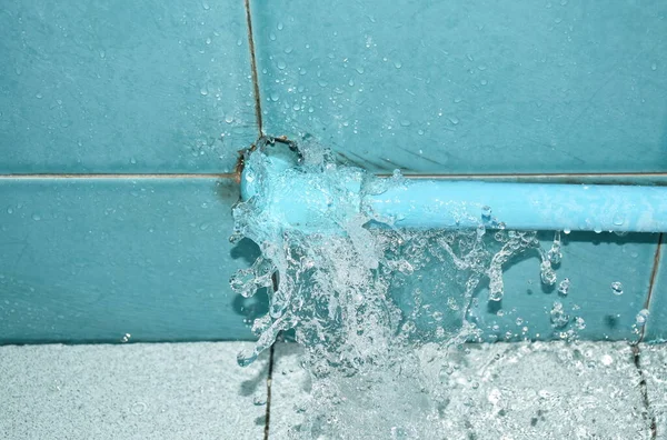 Water Splashing Broken Plumbing Blue Polythene Pipe Line Bathroom — 스톡 사진