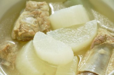 boiled slice radish with pork bone soup on bowl