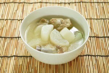 boiled slice radish with pork bone soup on bowl
