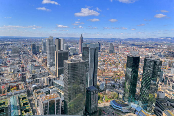 Skyscrapers and commercial buildings in the financial district of Frankfurt. Hessen. Tall glass buildings. View from the Main Tower