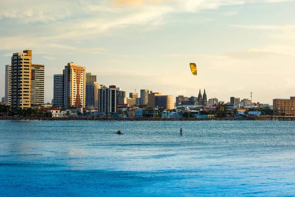 Sunset on the sea of Fortaleza Brazil with silhouette of a shipwreck