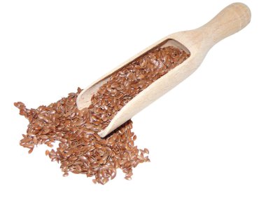 Tahta kaşıkta keten tohumu - beyaz kaşıkta izole