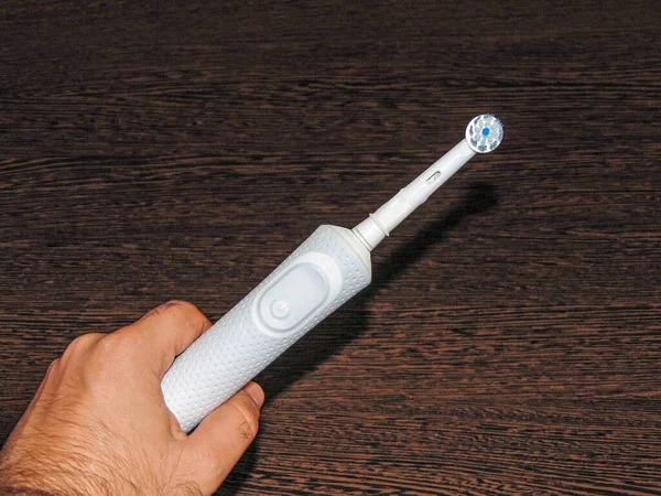 White Electric Toothbrush One Hand — Stock Photo, Image