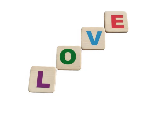爱这个词是由彩色字母组成的 — 图库照片