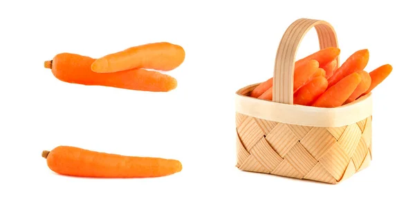 Bouquet de carottes fraîches crues dans un panier en osier isolé sur blanc — Photo