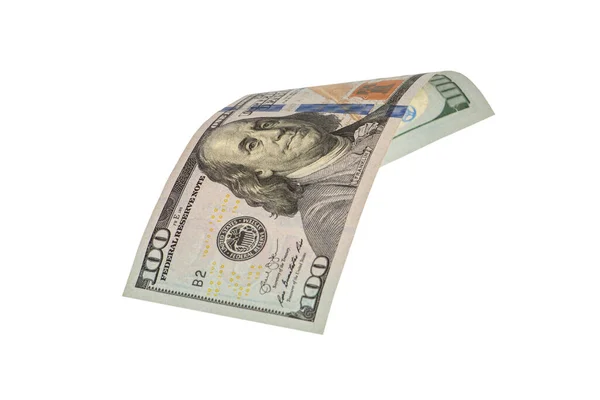 白い百ドル札の上に隔離する。アメリカのお金は半分に折り畳まれ、クローズアップ. — ストック写真