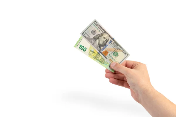 白い背景に手にお金、人間の手の中に孤立したお金。100ドル紙幣と100ユーロ紙幣. — ストック写真