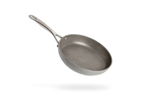 Black frying pan isolated on white background. Frying pan with non-stick coating.Non-stick frying pan made of titanium and granite. Isolate with shadow — Stock Photo, Image