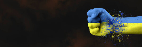 Accession of Ukraine to the European Union.The concept of Ukraines accession to the EU.The fist is painted in the colors of the Ukrainian flag of blue and yellow with the flag of the European Union.