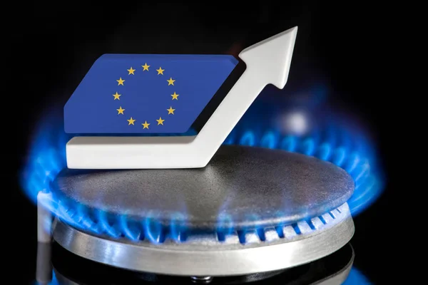 Gas price. Rise in gas prices in European Union. A burner with a flame and an arrow up, painted in the colors of the European Union flag. The concept of rising gas or energy prices