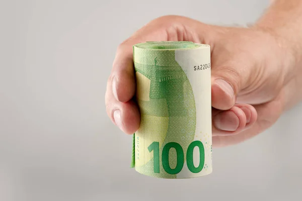 Hand Holds Roll 100 Euro Banknotes Euro Banknotes Rolled White — Foto de Stock