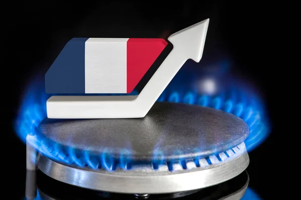 Gas price. Rise in gas prices in France. A burner with a flame and an arrow up, painted in the colors of the France flag. The concept of rising gas or energy prices