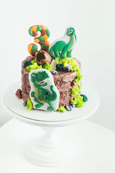 Birthday Cake Little Fan Dinosaurs White Background Cake Brown Rustic — Stock Photo, Image