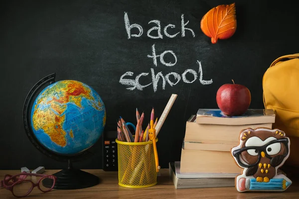 School Supplies Next Globe Stack Books Blackboard Background Back School — Fotografie, imagine de stoc