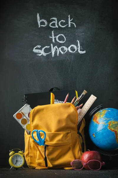 Yellow Backpack School Supplies Next Globe Red Apple Glasses Black — Stockfoto