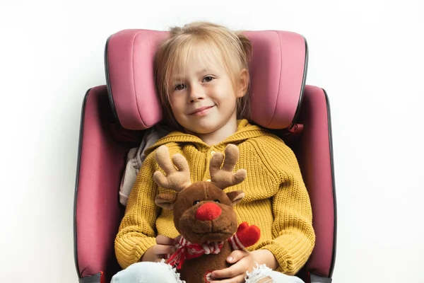 Cute Little Girl Holding Stuffed Rudolph Red Nosed Reindeer Toy — Stok fotoğraf