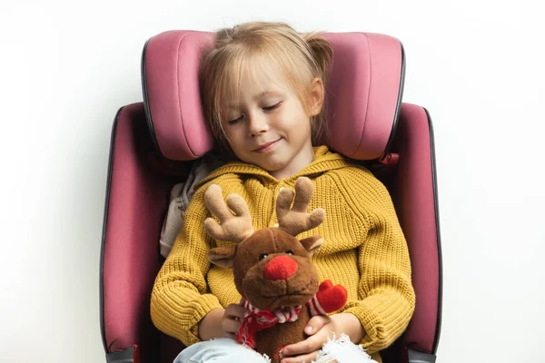 Cute Little Girl Holding Stuffed Rudolph Red Nosed Reindeer Toy — Stok fotoğraf