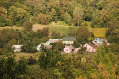 Wooden house in the Ukrainian village.On the outskirts of the village.Surroundings, outside the city