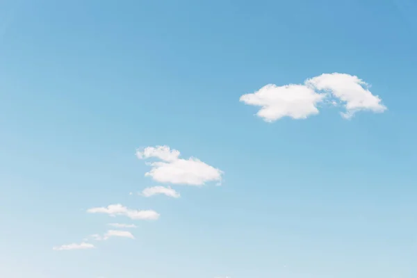 Fluffy white clouds light blue sky, clean — Stock Photo, Image