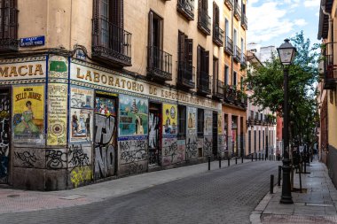 Madrid, Spain - June 5, 2022: Malasana quarter in central Madrid. It is a vibrant neighborhood and a center for the hipster phenomenon, full of lively bars and clubs overflowing with young people. Its