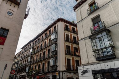 Madrid, Spain - June 5, 2022: Malasana quarter in central Madrid. It is a vibrant neighborhood and a center for the hipster phenomenon, full of lively bars and clubs overflowing with young people. Its