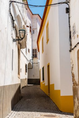 Scenic view of the old town of Elvas in Alentejo, Portugal. Narrow streets of whitewashed white houses