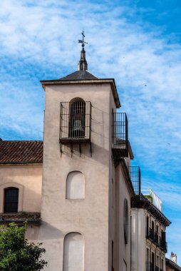 Tower of the Church of San Ildefonso in Malasana district in Madrid. Malasana is one of the trendiest neighborhoods in Madrid,