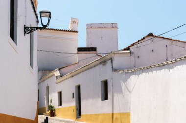 Scenic view of the old town of Elvas in Alentejo, Portugal. Narrow streets of whitewashed white houses
