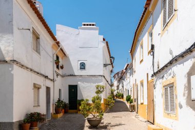 Scenic view of the old town of Elvas in Alentejo, Portugal. Narrow streets of whitewashed white houses
