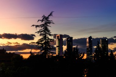 Madrid, Spain - September 25, 2020: Skyline of Cuatro Torres financial district at sunset