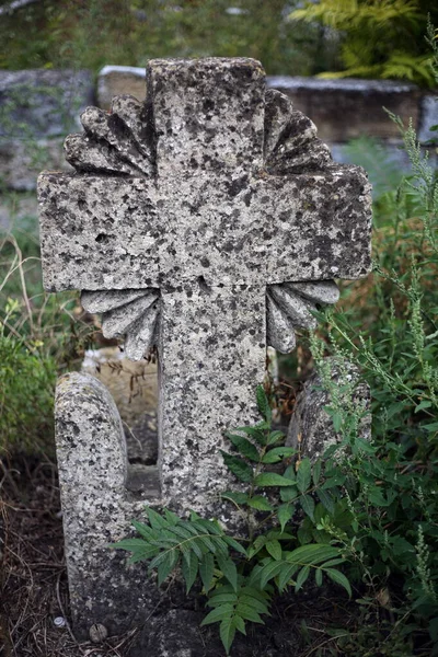 Old crosses and monuments in the cemetery.Unknown graves