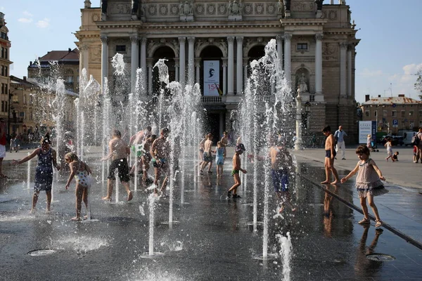 Lviv Ukraine June 2022 Children Bathe Fountain Building Lviv National —  Fotos de Stock