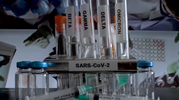 Sars Cov Test Tubes Labelled Alpha Gamma Delta Beta Omicron — Stok video