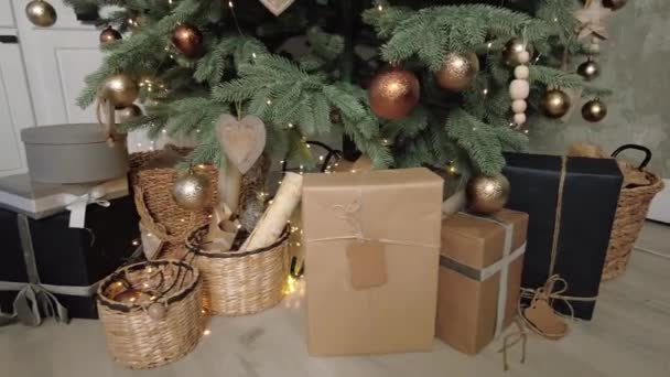 Artificial eco Christmas tree decoration with packages gifts. Holiday mood — Stockvideo