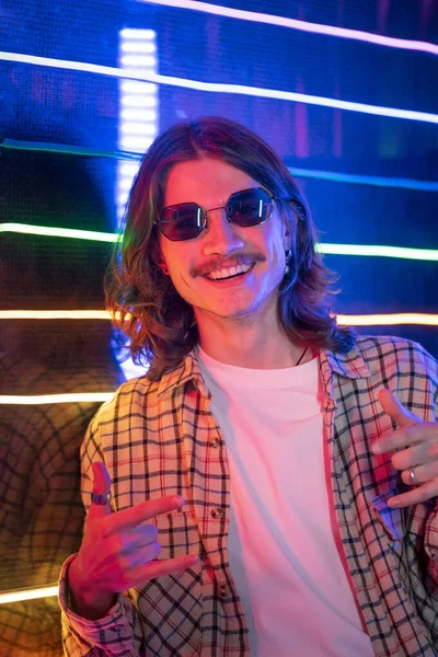 Portrait of cool young man in a modern neon style — Stock Photo, Image