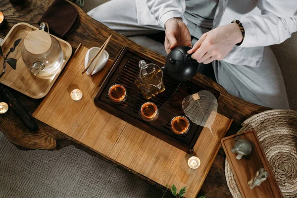 Beautiful traditional chinese tea ceremony with candle and decoration